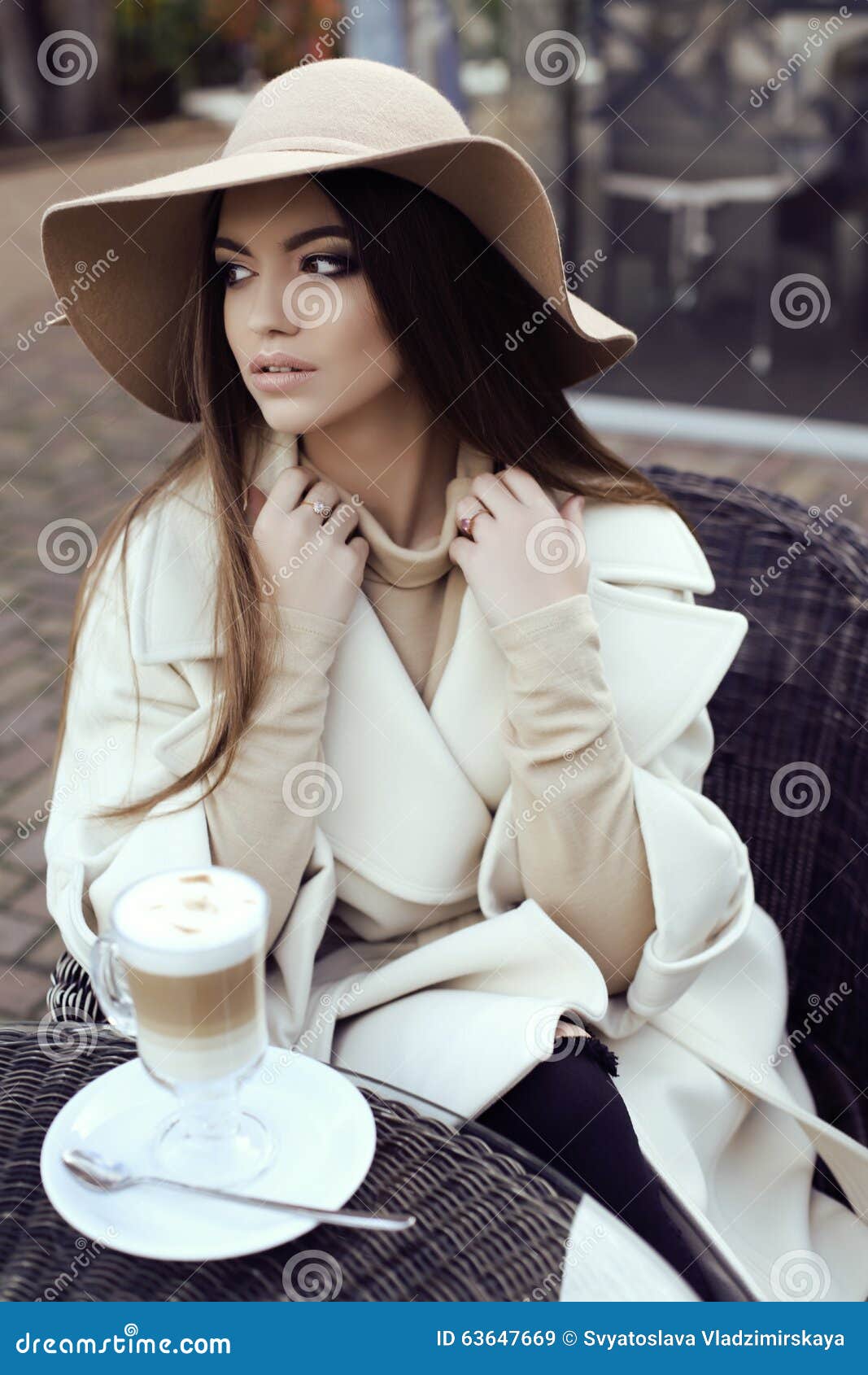 Glamour Girl With Dark Straight Hair Wears Luxurious Beige 