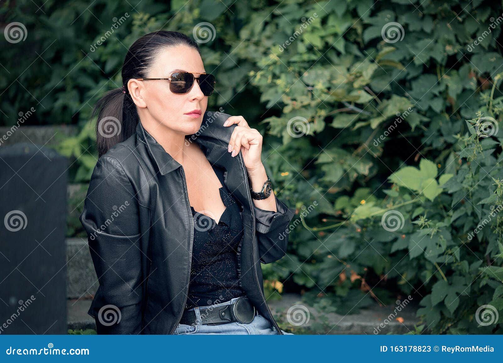 Glamour Woman Holding Her Jacket Collar Stock Photo Stock Image - Image ...