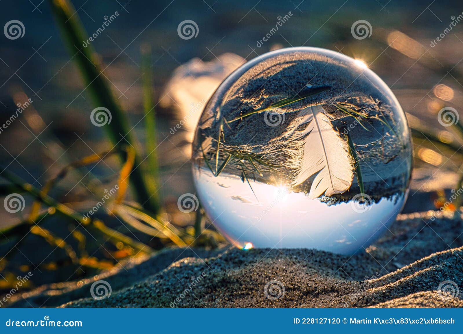 Glass Ball on Beach, Capturing the Landscape in the Glass Stock Photo