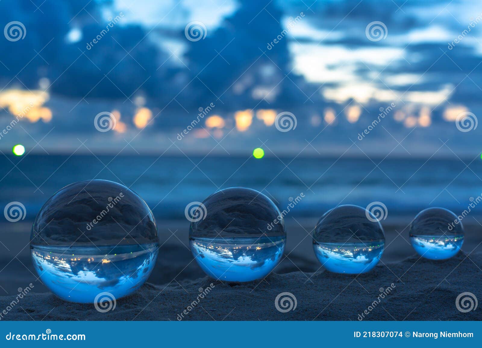 the 4 Glass Balls are Arranged from Large To Small Placed on the Beach at  Sunrise Stock Photo - Image of blue, dimensional: 218307074