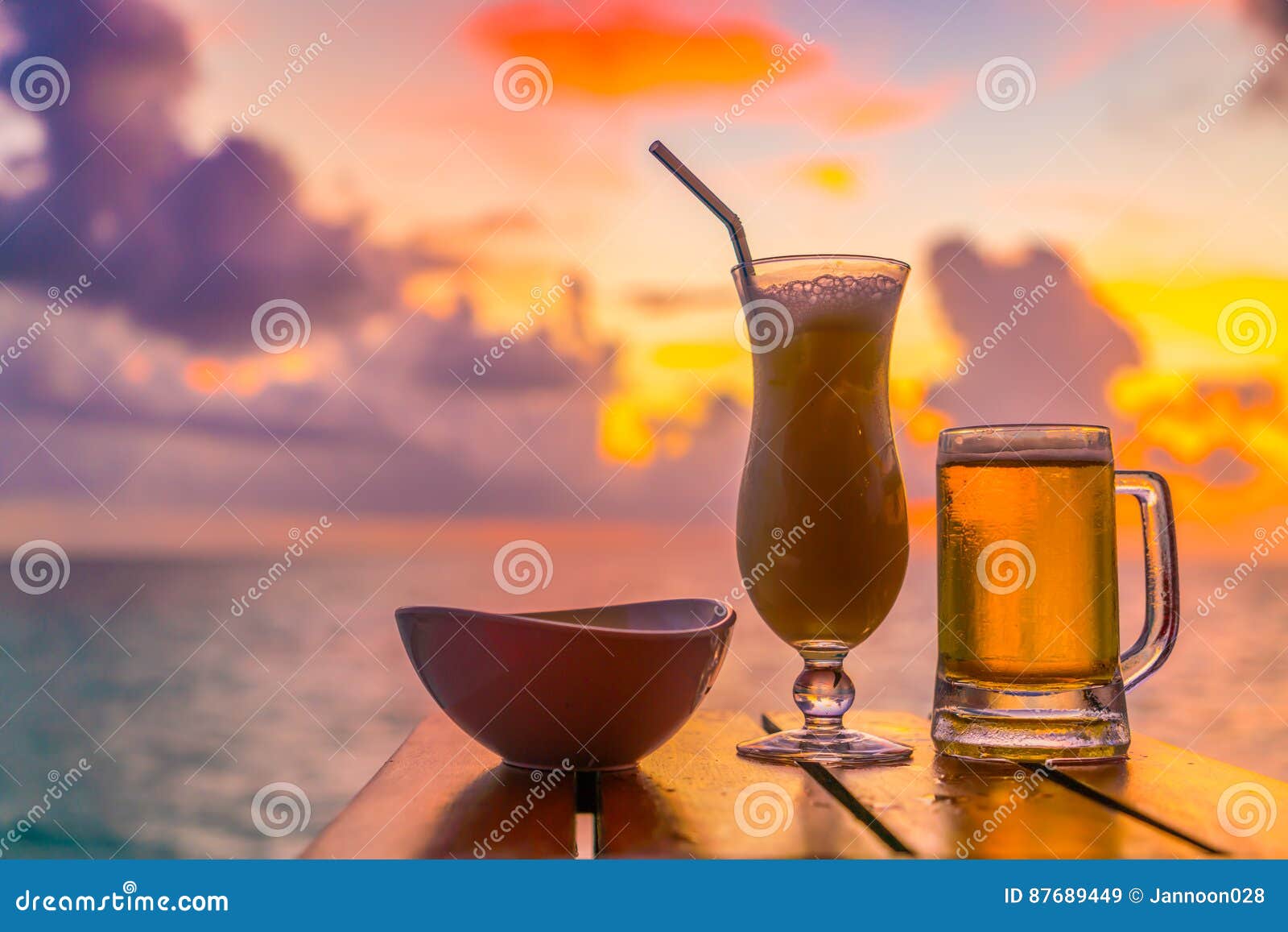 A Glass of Beer with Beautiful Tropical Maldives Island . Stock Image ...