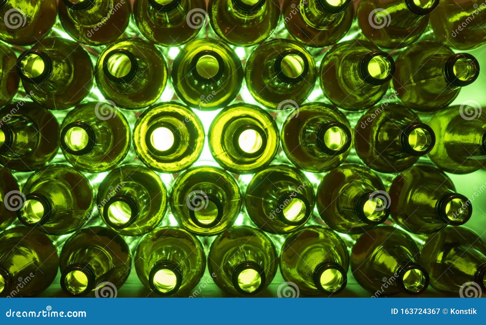 Glass Beer Bottles Lie in Rows, Necks on Camera, Shallow Depth of Sharp
