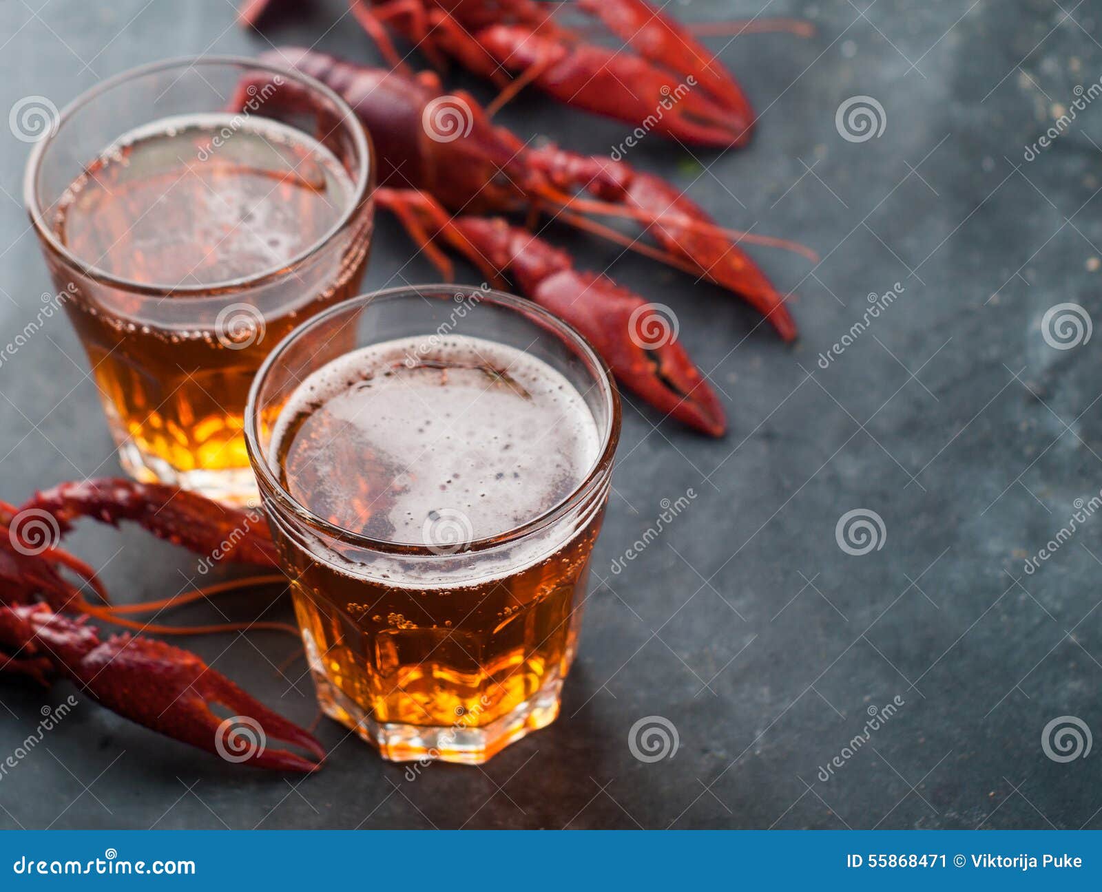 Glass of beer and lobster stock image. Image of appetizer 55868471
