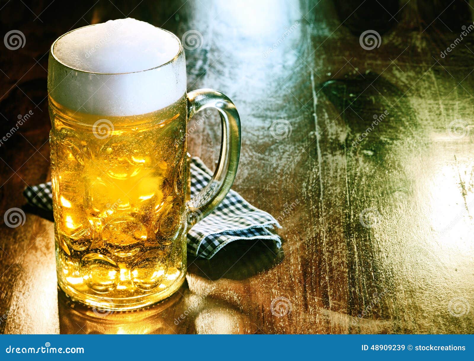 glass beer mug with golden ale or draft