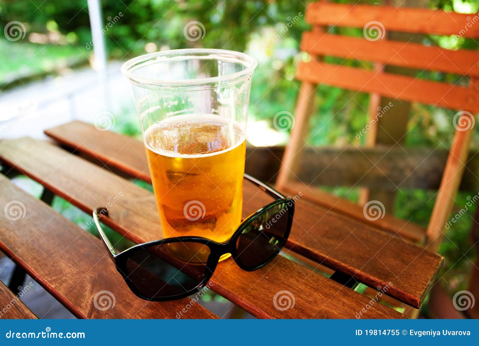 Glass of Beer and Sunglasses Stock Image Image of froth, garden 19814755