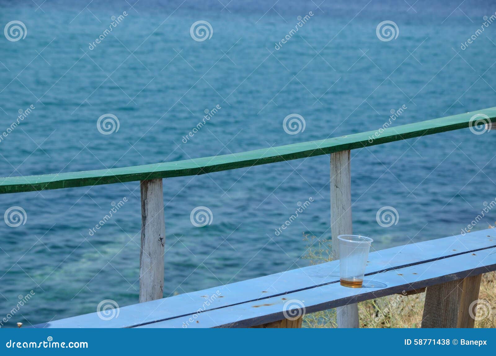 Glass on bench stock photo. Image of cafe, coffee, summer 58771438