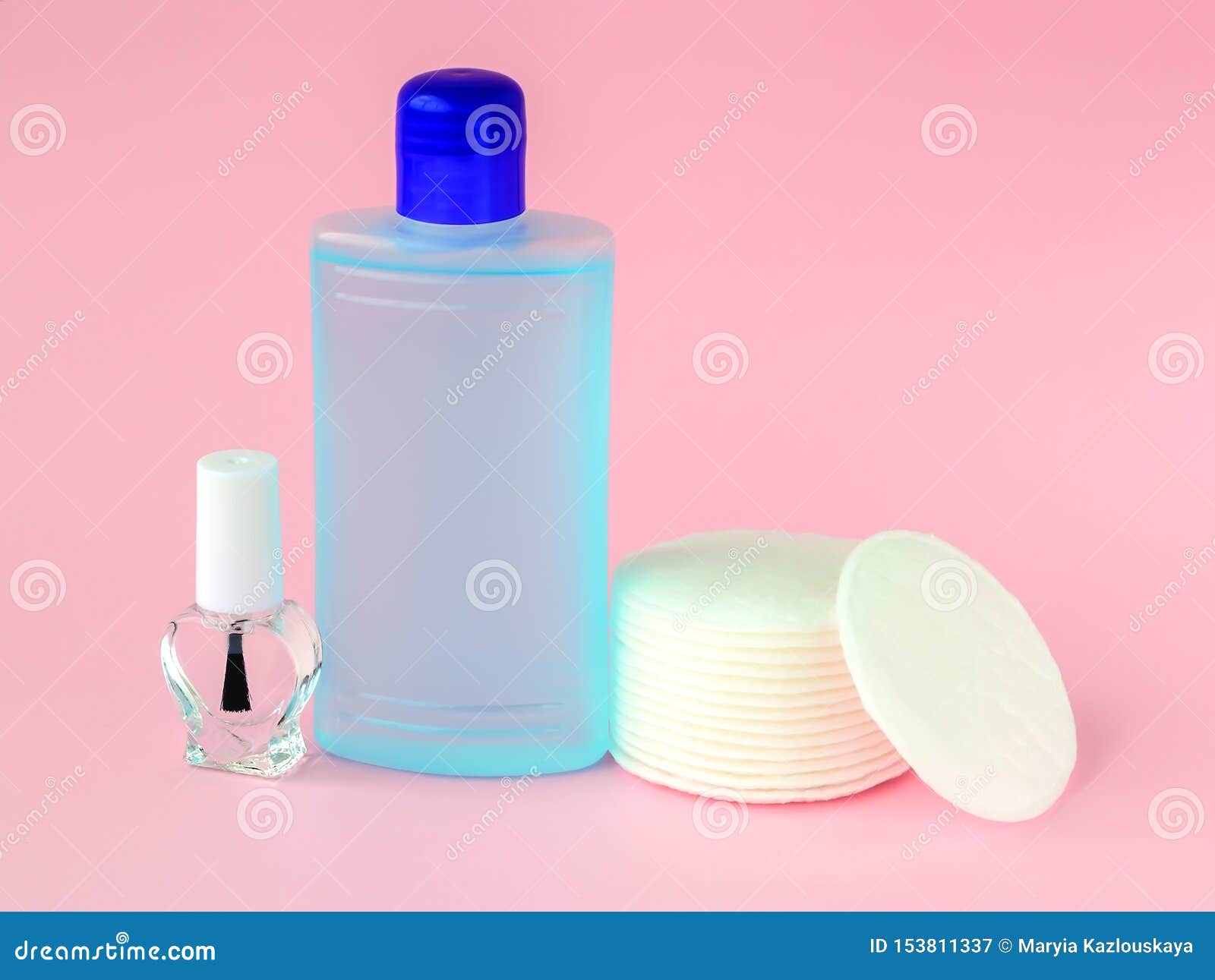 Glass Bottle with Colorless Nail Polish, Plastic Bottle with Nail Varnish  Remover and Cotton Pads on a Pastel Pink Background. Stock Image - Image of  group, cleansing: 153811337