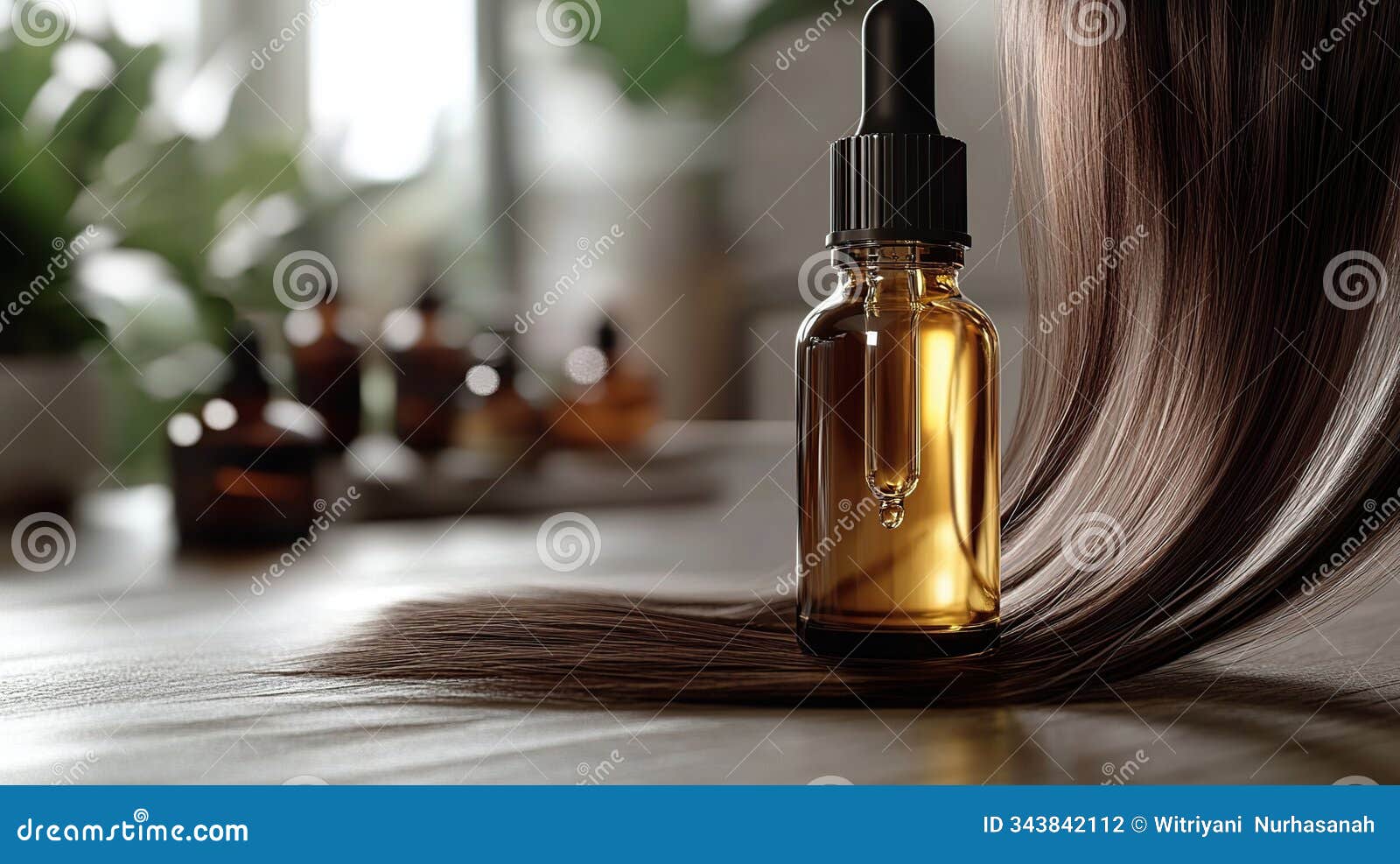 a glass bottle with a dropper filled with golden liquid sits on a table with a strand of long brown hair in the background