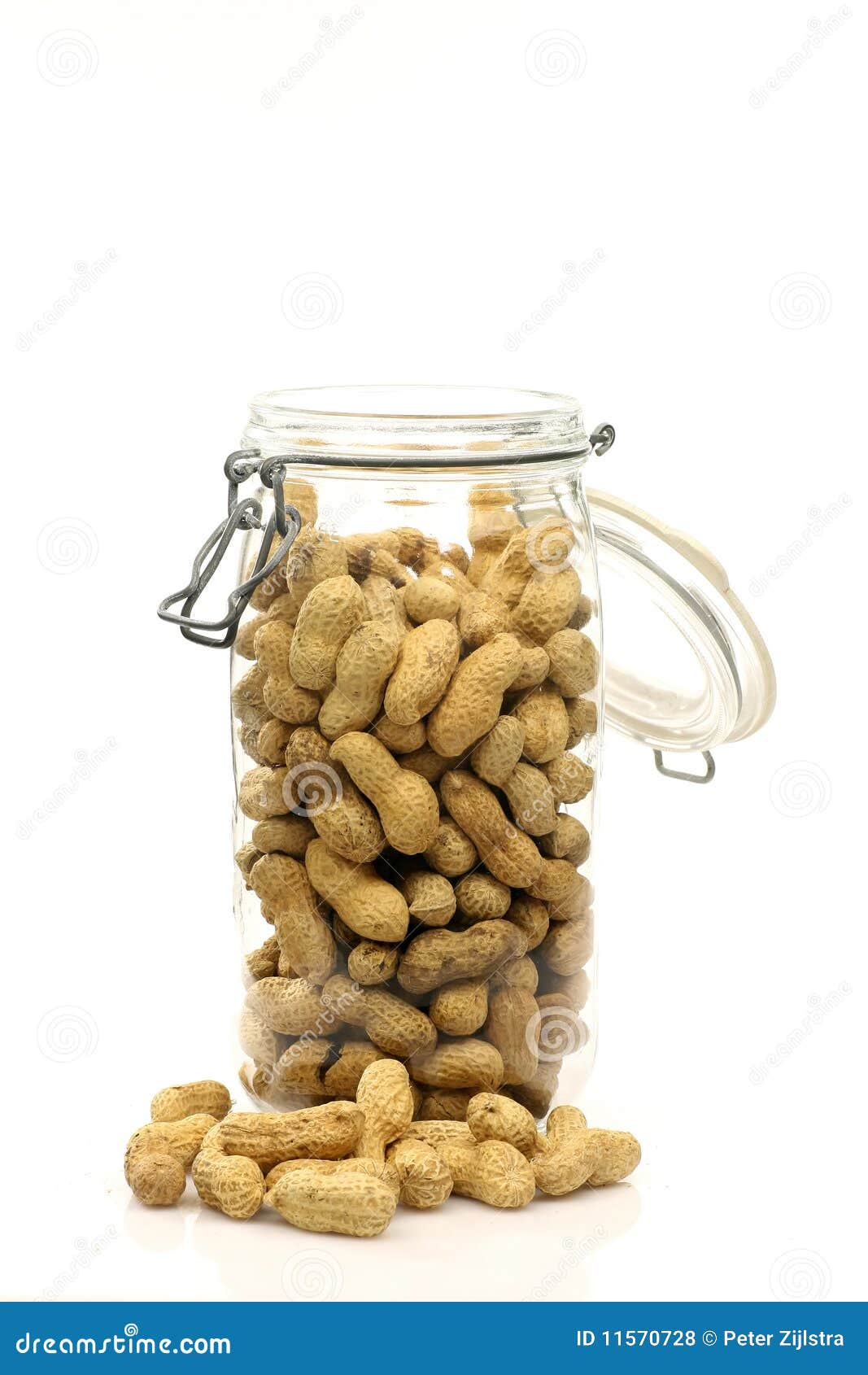 Glass bottle with peanuts stock photo. Image of snack 11570728