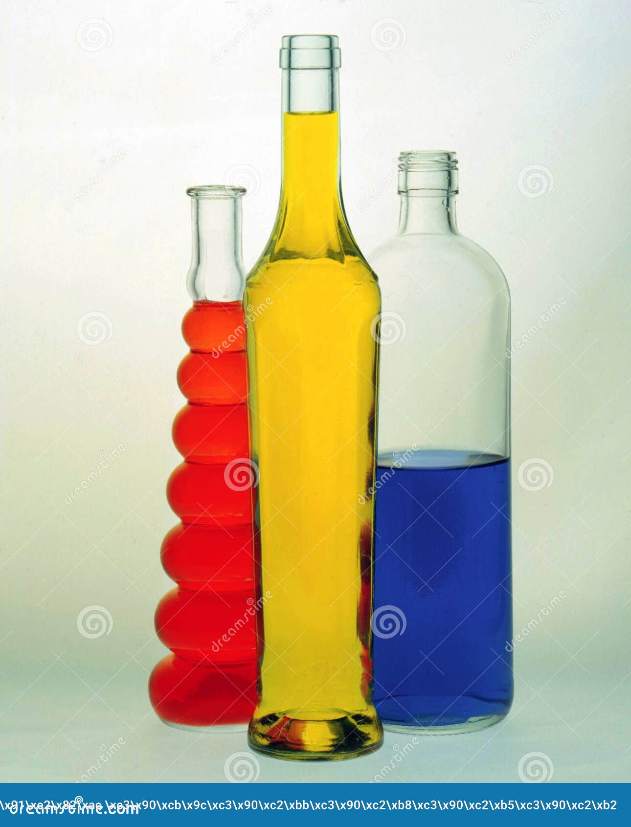 Glass Bottles Filled with Colored Liquids Stock Photo Image of
