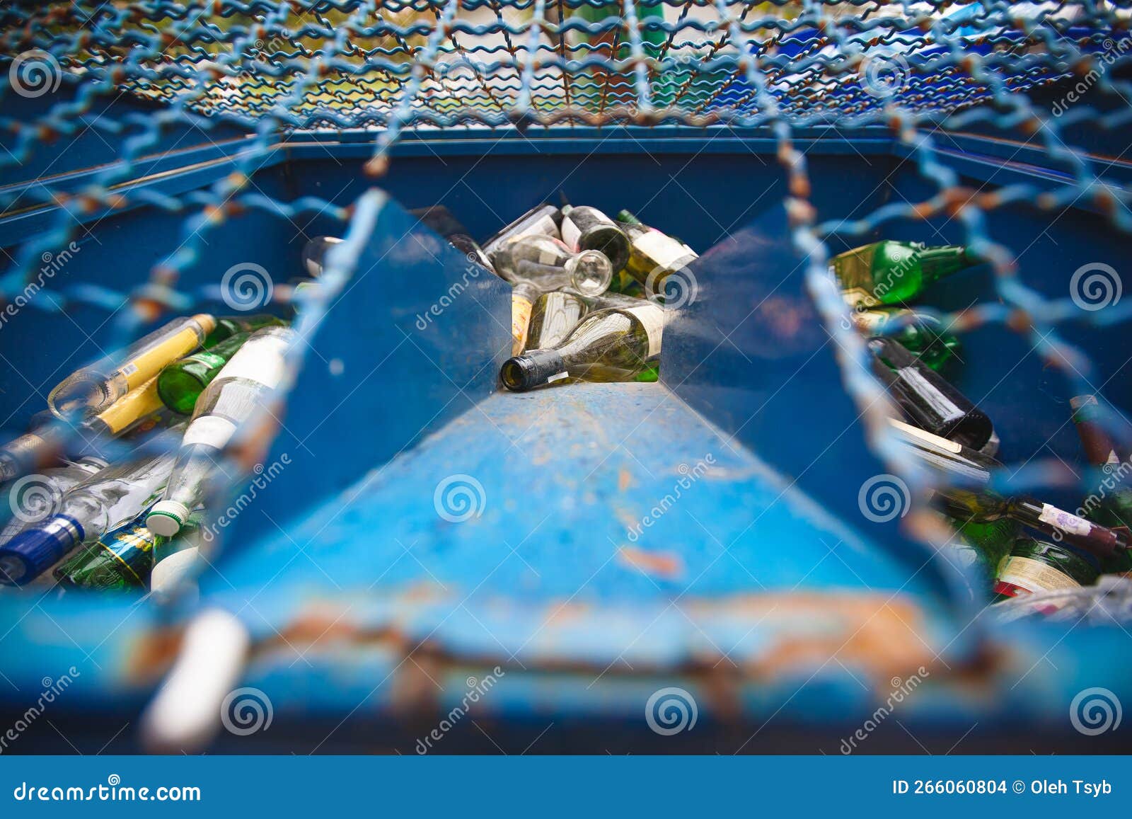 Glass Bottles in the Garbage Can for Receiving Glass Containers Stock