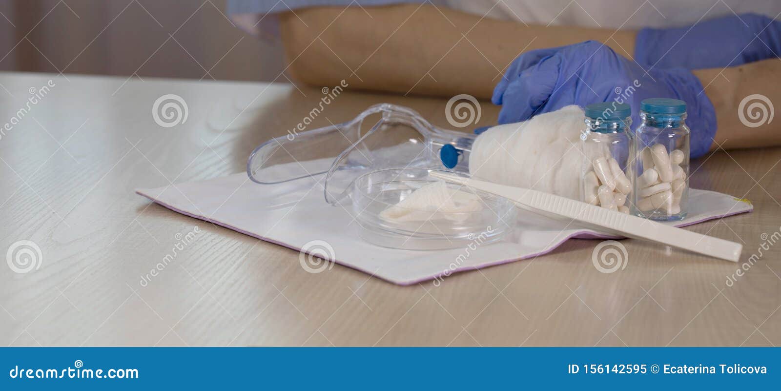 Glass Bottles With Pills In Front Of Gynecologist Vaginal Speculum In The Background Stock Image