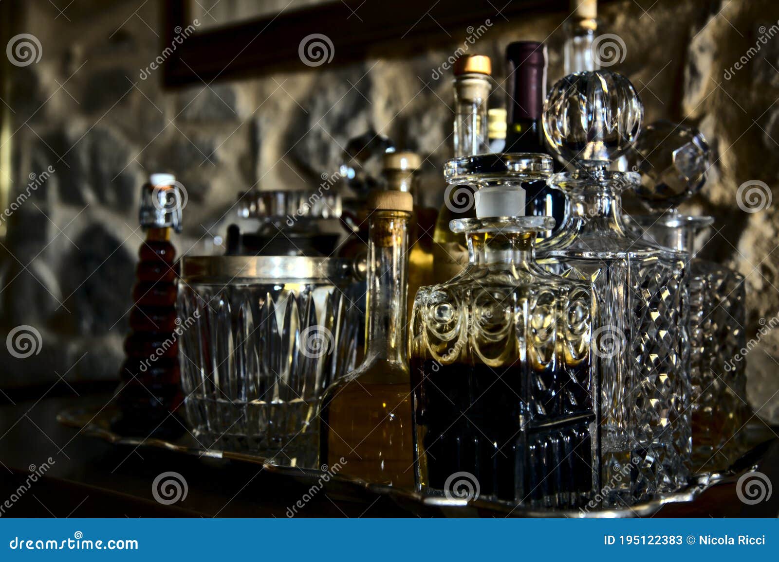 Glass Bottles on a Silver Tray with Liquor in Them Stock Image Image