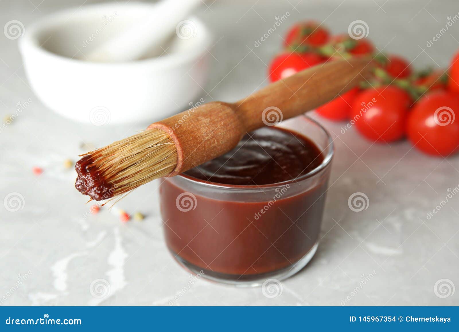 Glass Bowl of Barbecue Sauce with Basting Brush Stock Photo Image of