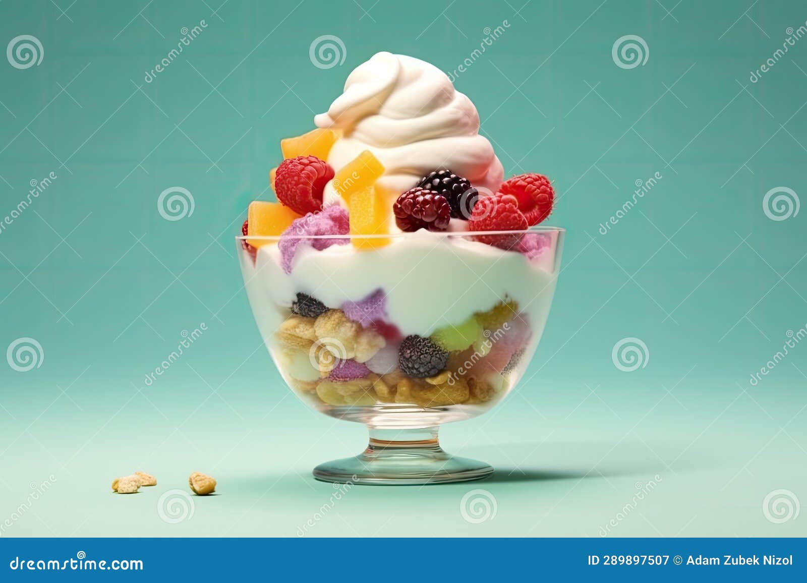 a glass bowl of fruit and yogurt