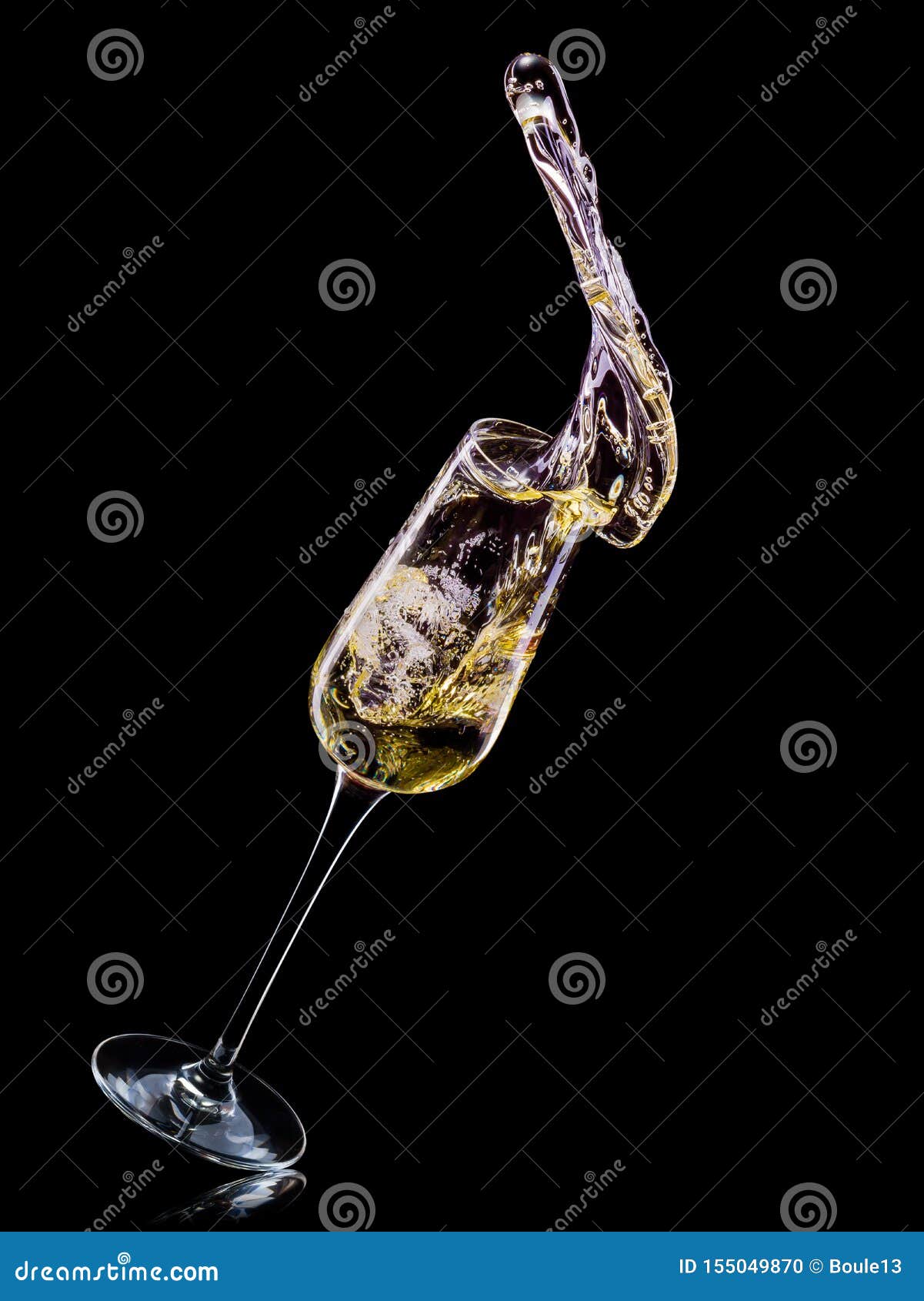 Glass For Champagne With Bubbles And Splashes Isolated On Black