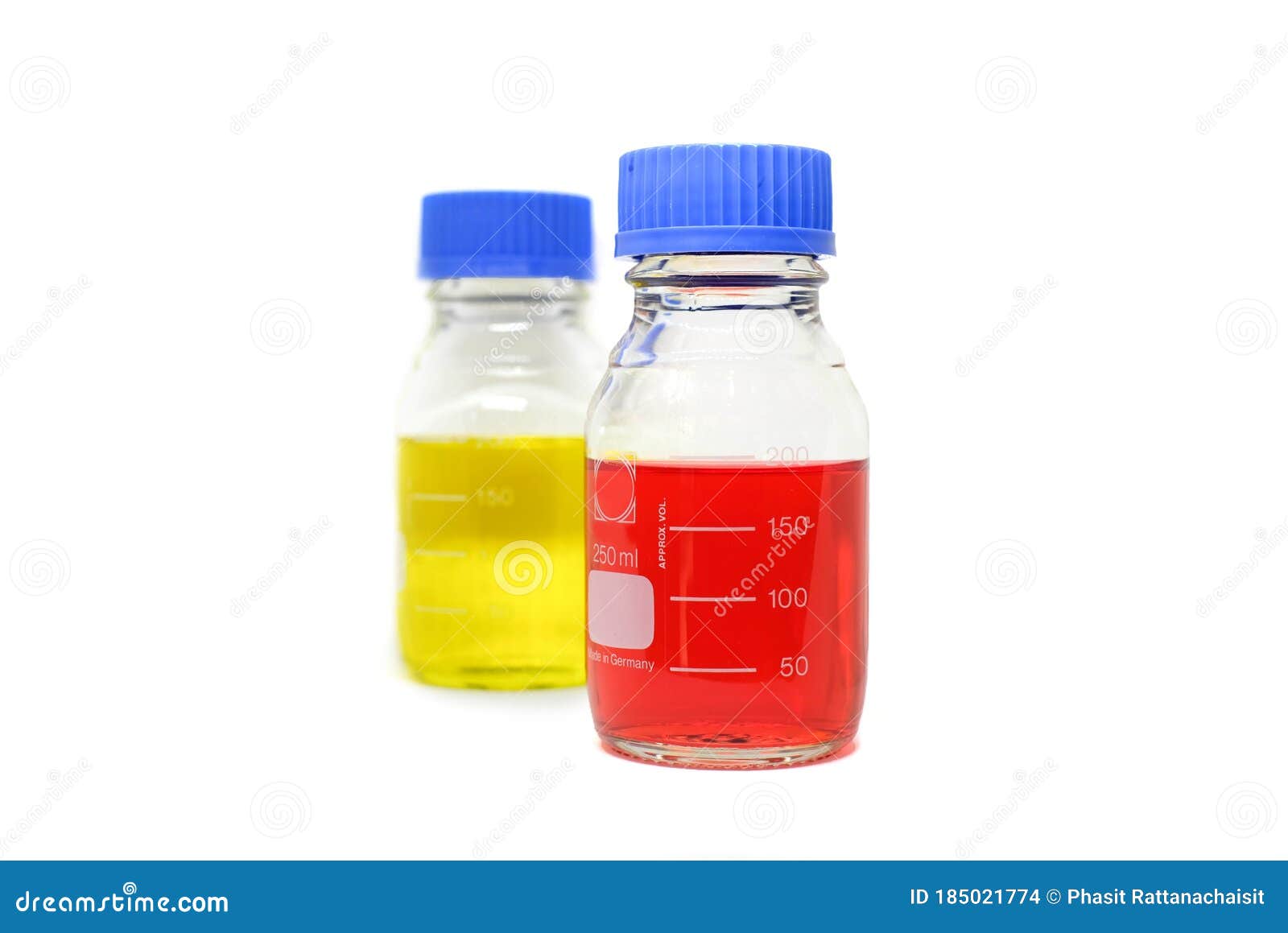 A Glass Chemistry Bottle with Red and Yellow Liquid or Solvent Used for ...