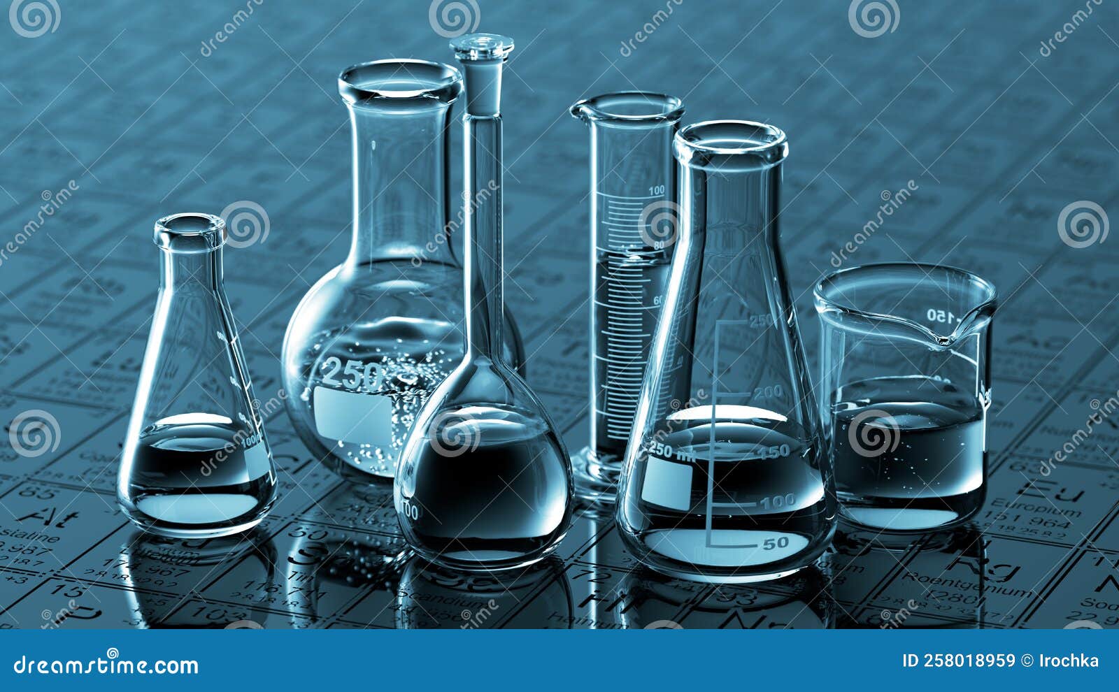 Glass Chemistry Lab Equipment on Blue Background. Chemistry Lab Concept