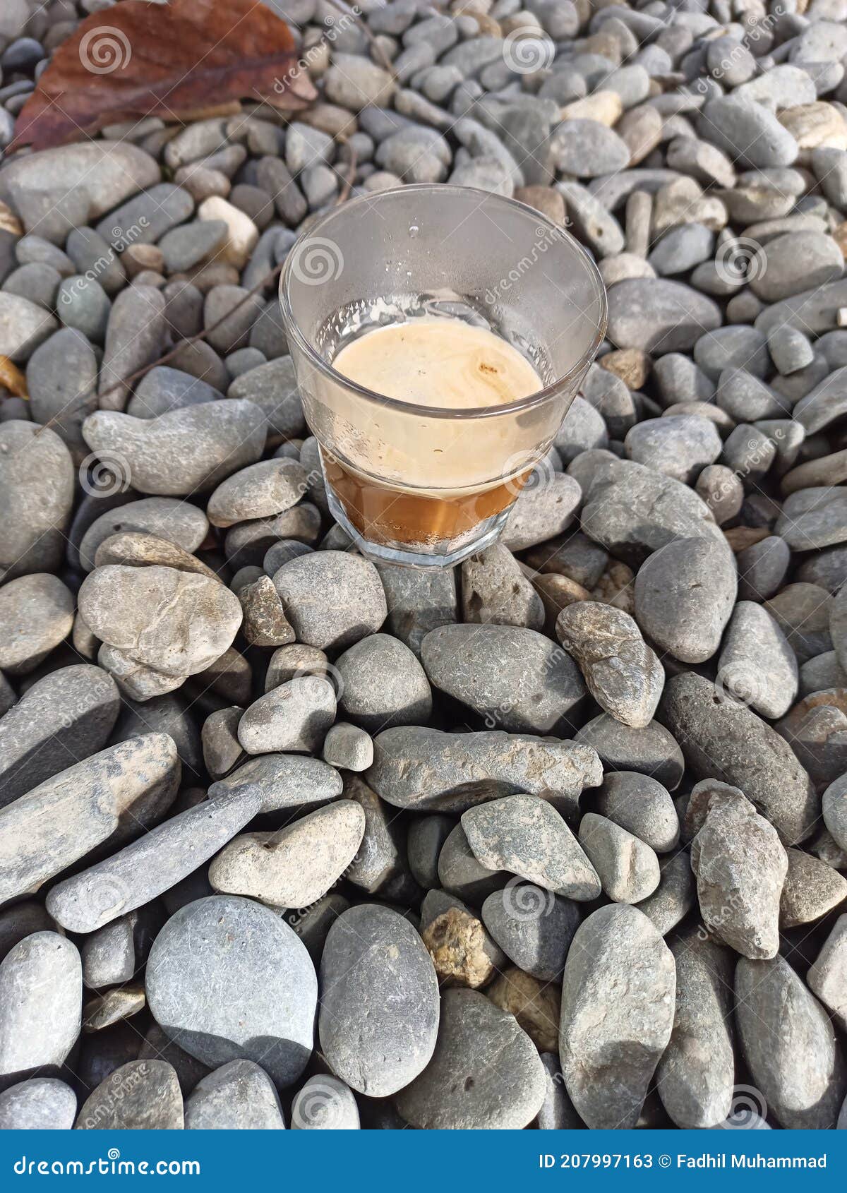 Drink on the rocks stock image. Image of bedrock, stonewall 207997163