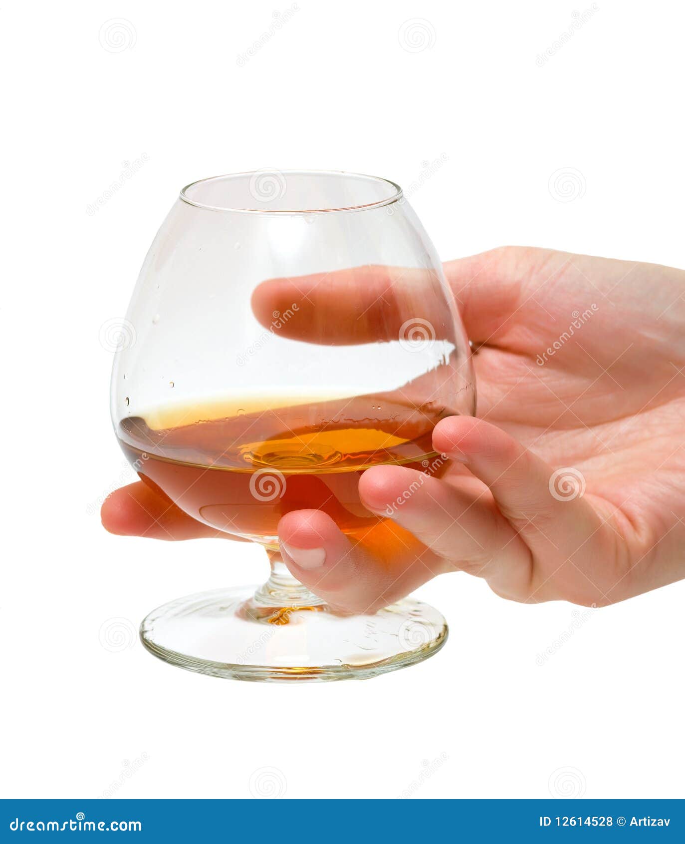 Glass of cognac stock photo. Image of alcohol, hand, cognac 12614528