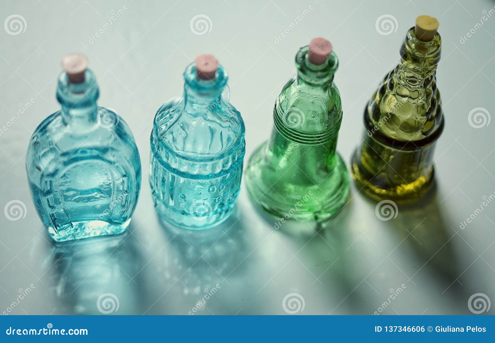 glass colourful bottles - still life