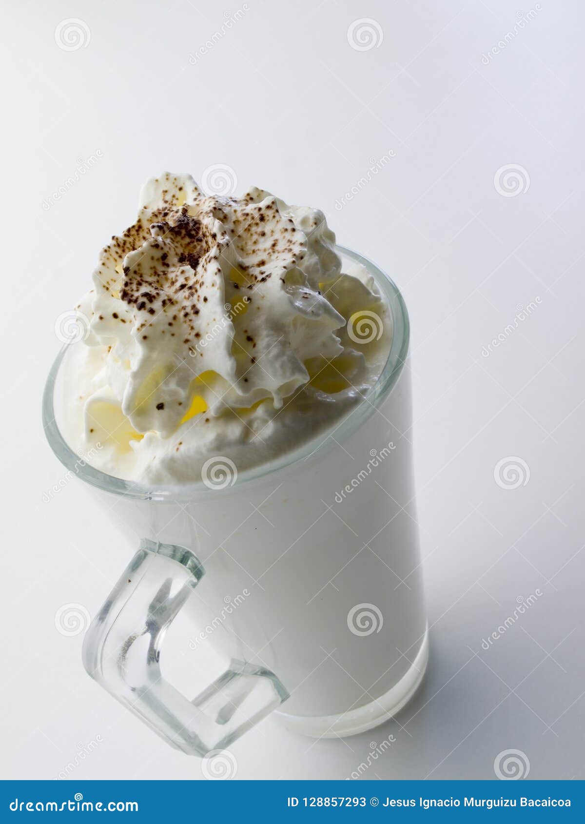A Glass Cup Filled With Whipped Crea