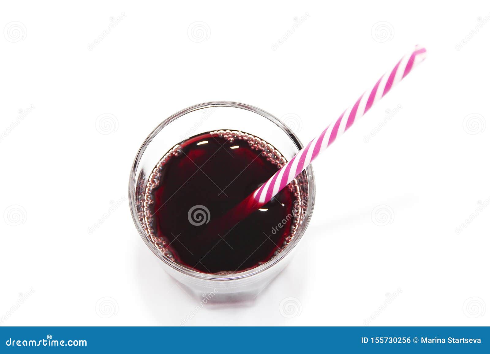 Glass Cup with Red Fruit Cherry Juice and a Drinking Can Stock Photo
