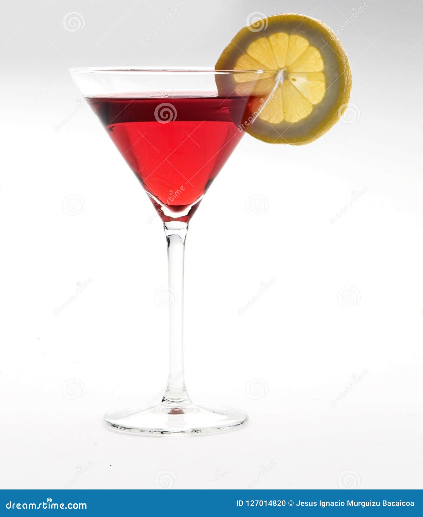 glass cup for snacks with martini inside and decorated with a slice of lemon