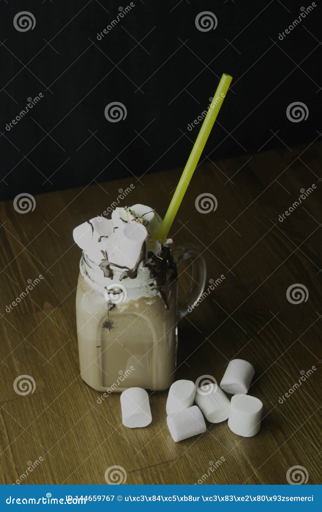 Glass Cups with Handles in Chocolate Drinks and Candies Stock Image