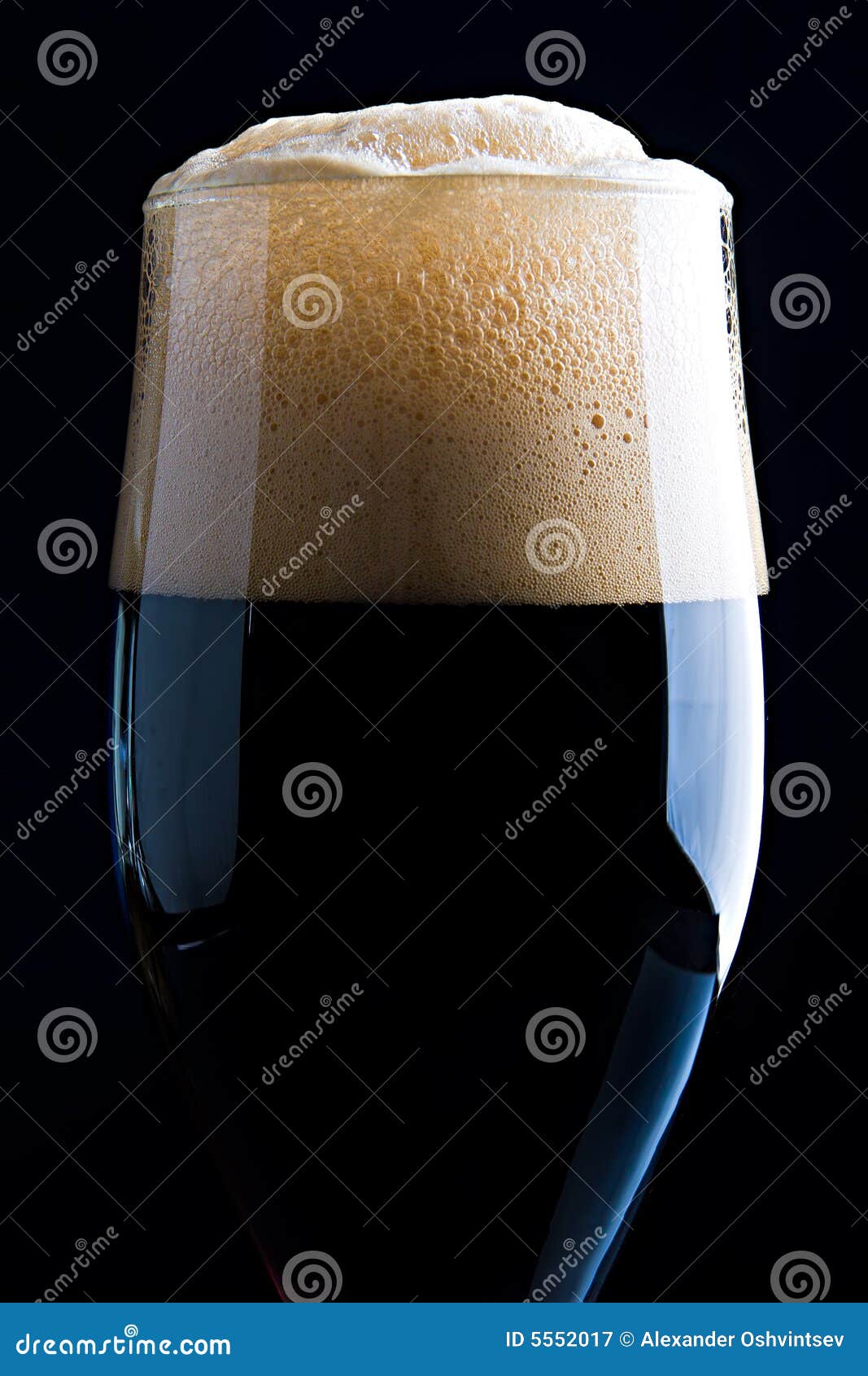 Glass of dark beer stock image. Image of close, froth 5552017