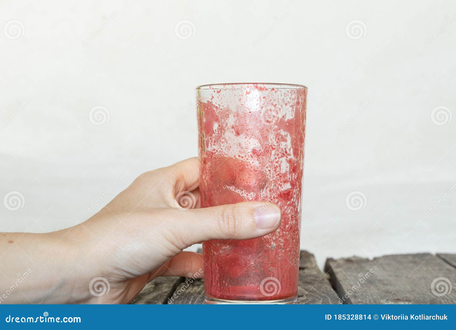 A Glass of Dirty Juice Stands on the Kitchen Table after Breakfast