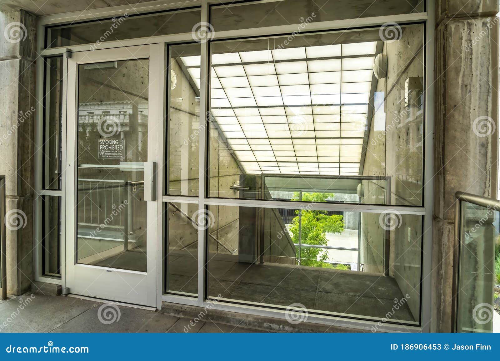 Download Glass Door And Wall With View Of Slanted Frosted Roof Over Stairway Of Building Stock Image Image Of Prohibited Sign 186906453