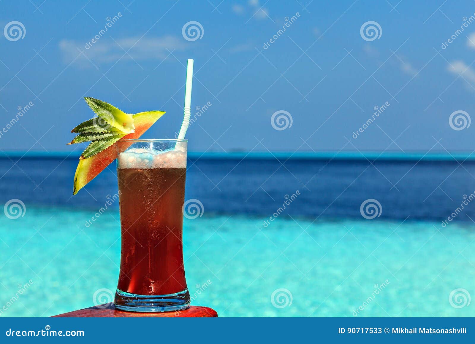 Glass of Drink is on a Beach Table Stock Image Image of cherry, soft