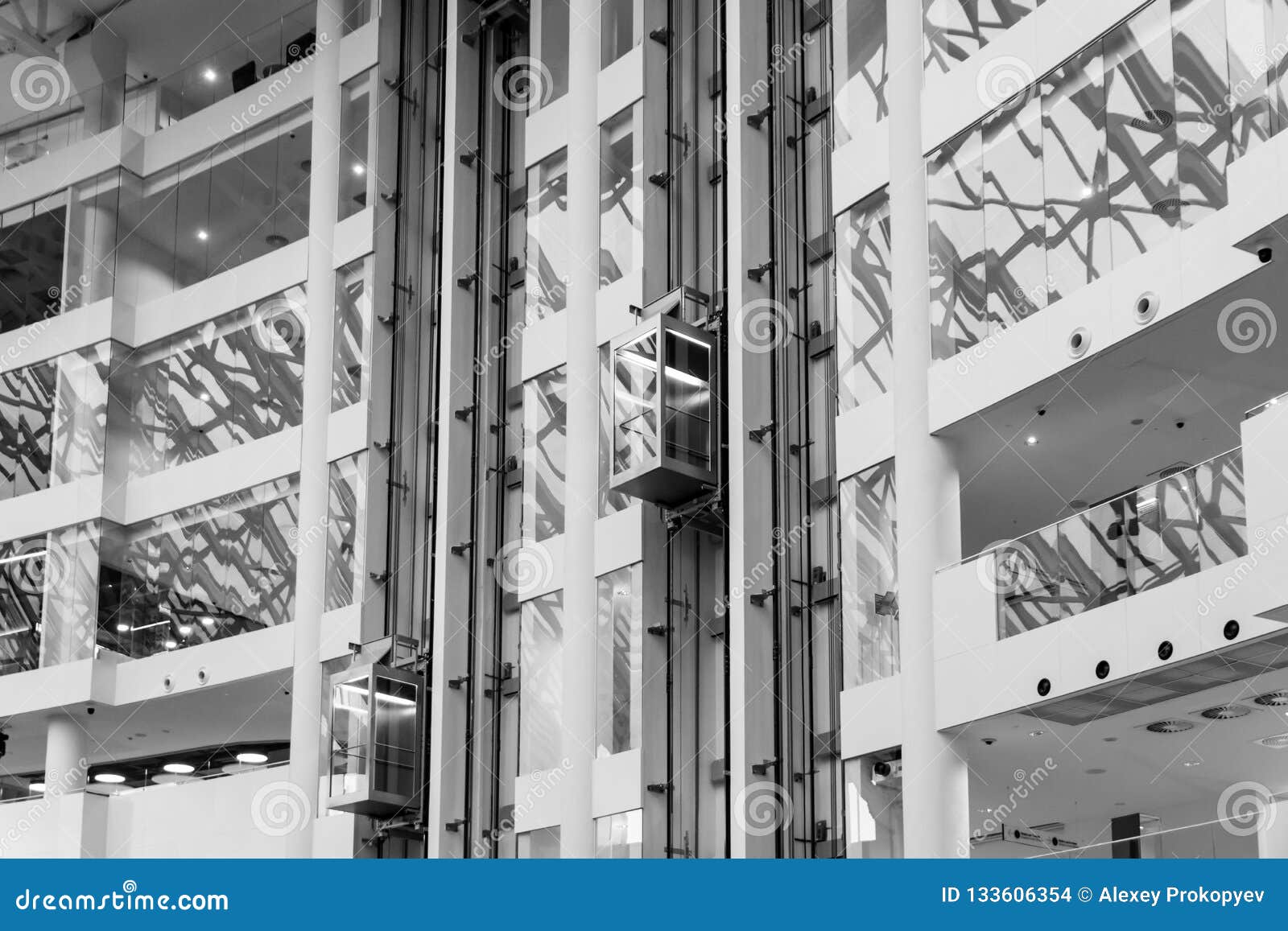 Glass Elevator in Office Building in Black and White Color, Elev Stock