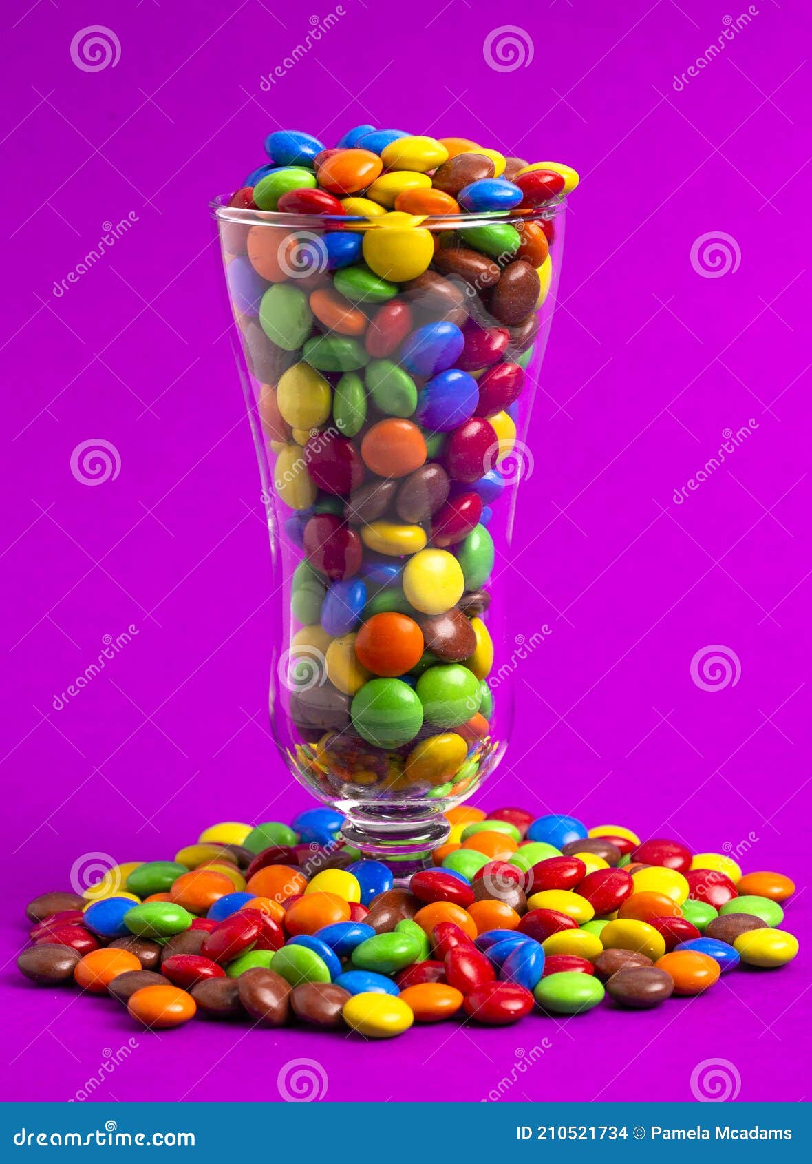 Glass Filled with Rainbow Colored Candy Coated Chocolate Buttons Stock Photo Image of