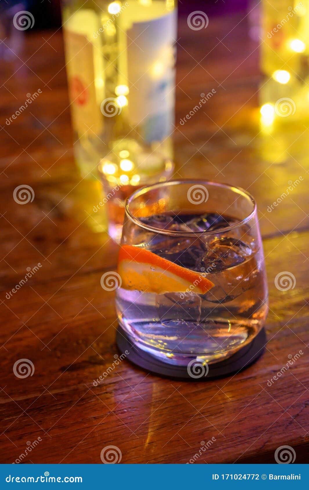 Glass of Gin with Tonic Water, Orange and Ice Stock Photo Image of