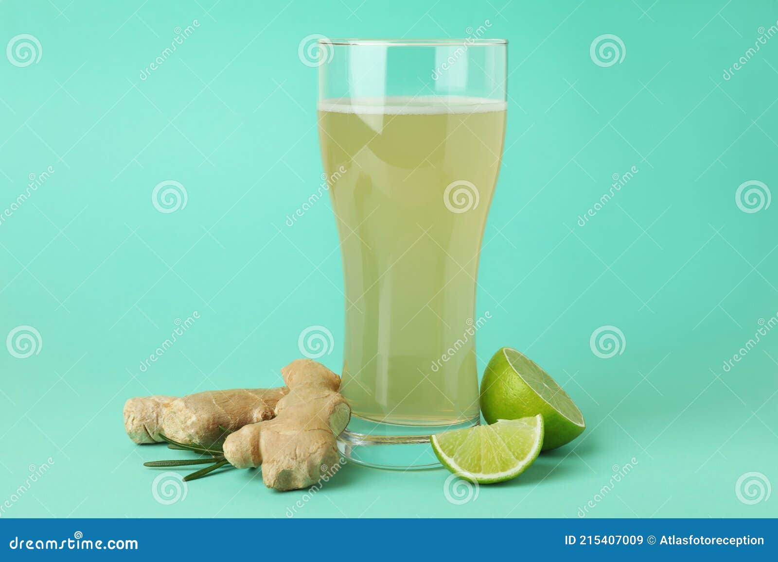 Glass of Ginger Beer and Ingredients on Mint Background Stock Image