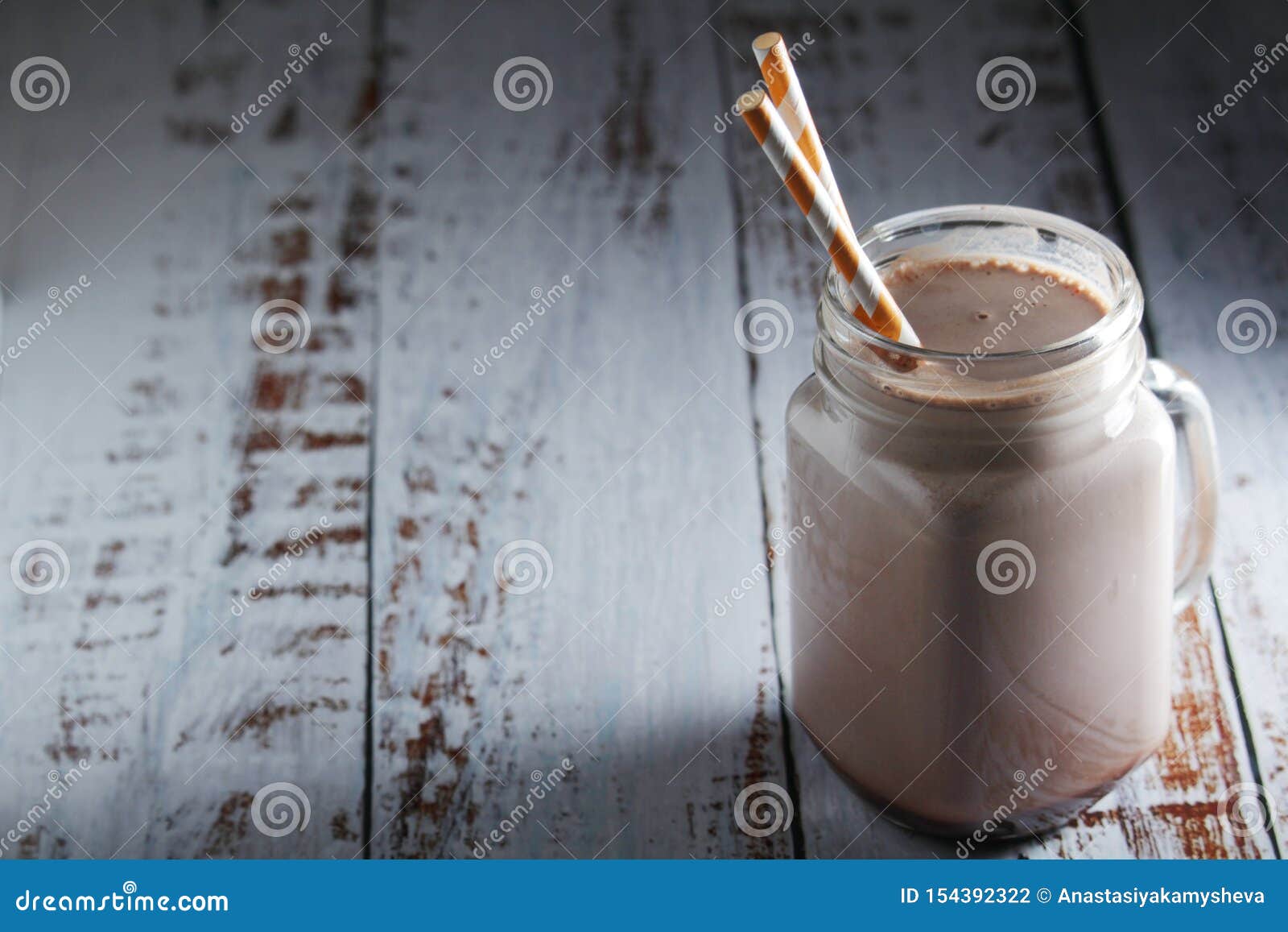 A Glass Jar with Chocolate Milk Drink Stock Photo Image of straw