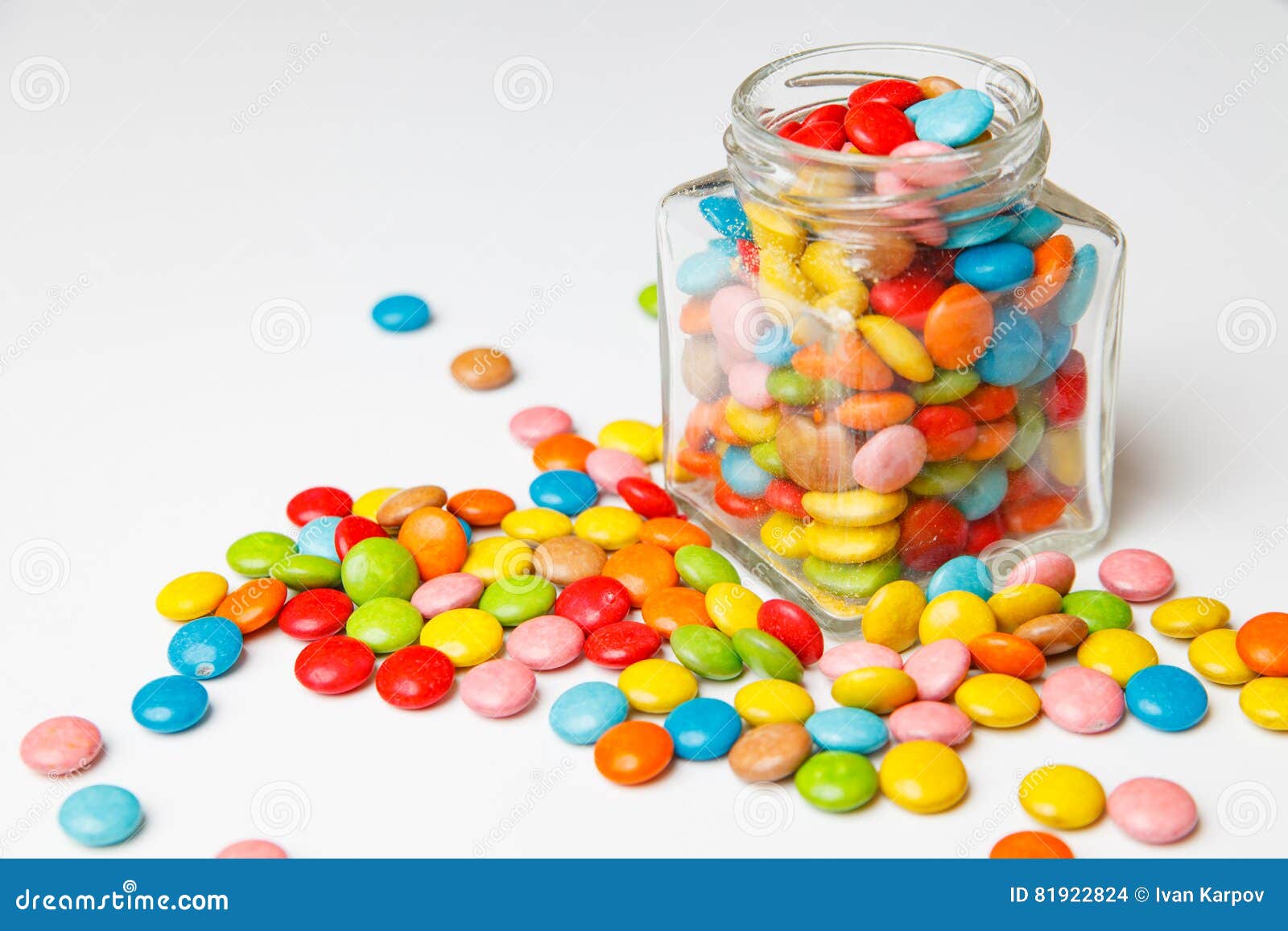 Glass Jar with Colorful Candy Scattered on the Boards. Festive ...