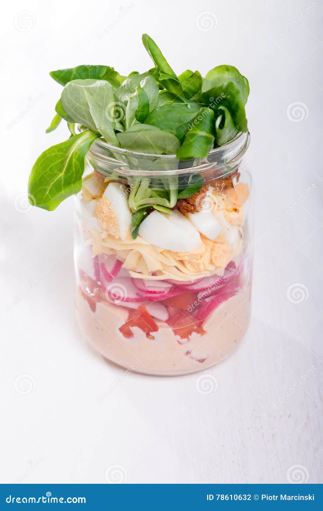 Glass jar with fresh salad stock photo. Image of sauce 78610632
