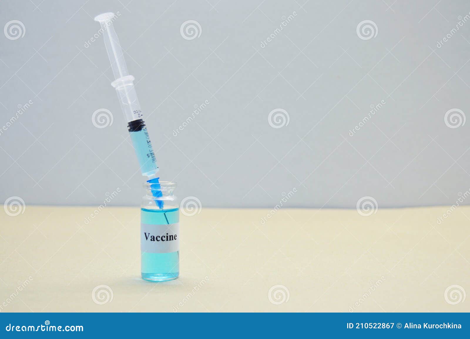 Glass Jar with Liquid Blue Vaccine and Syringe on Light Background Stock Image Image of