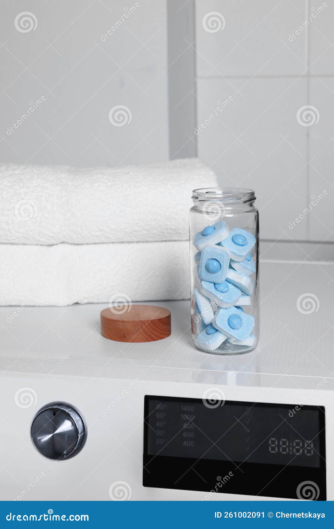 Glass Jar with Water Softener Tablets on Washing Machine in Bathroom Stock Image Image of