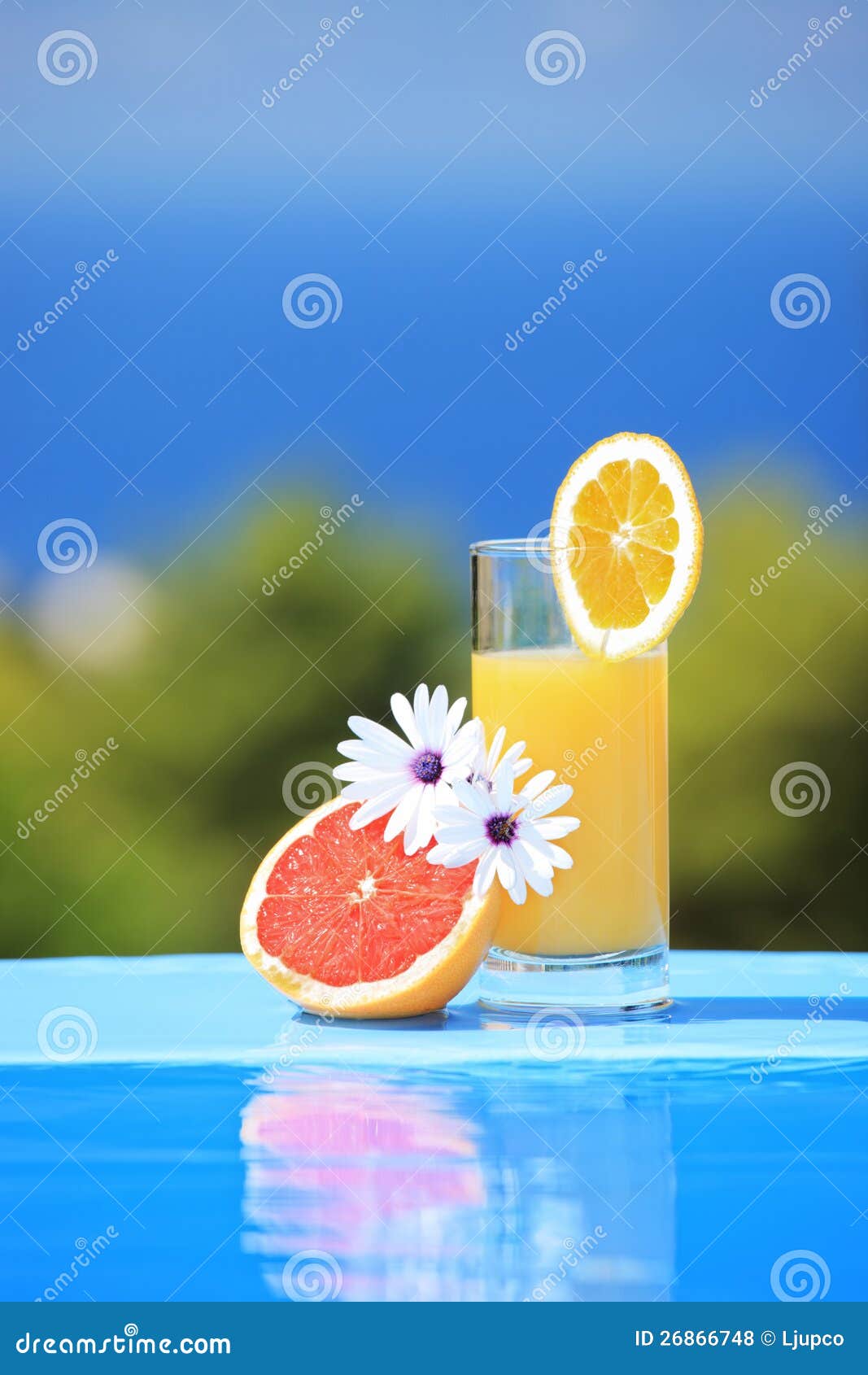 Glass of Juice and Flowers on a Pool Stock Photo Image of natural, breakfast 26866748