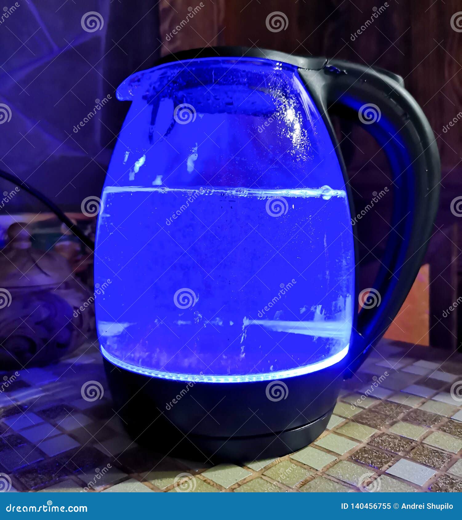 The Glass Kettle Glows Blue Stock Image Image of shiny, teapot 140456755