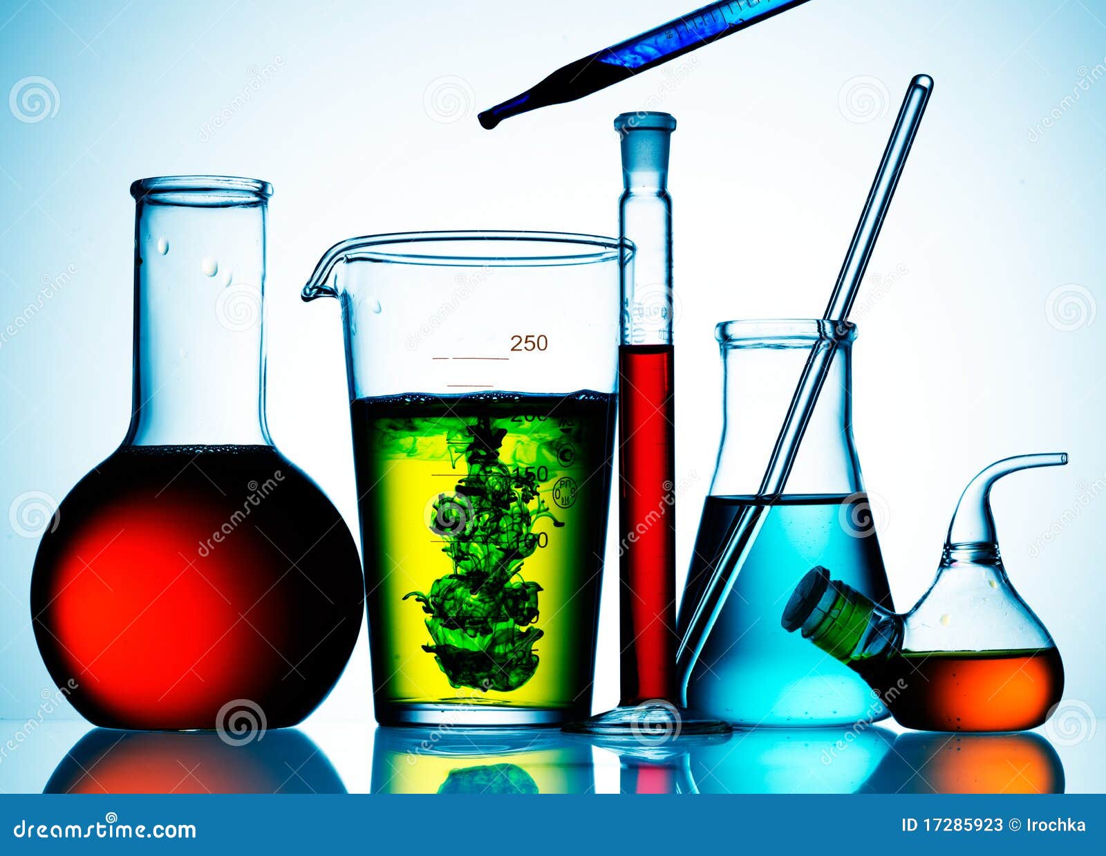 glass lab beakers and liquids
