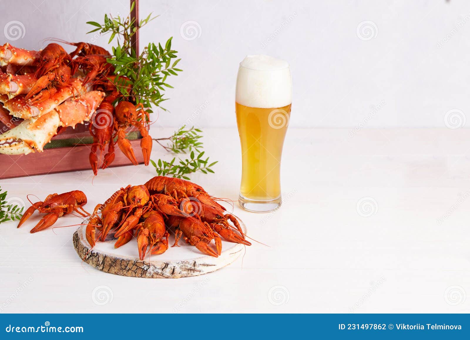 A Glass of Light Beer with Boiled Crayfish and Crabs Stock Photo