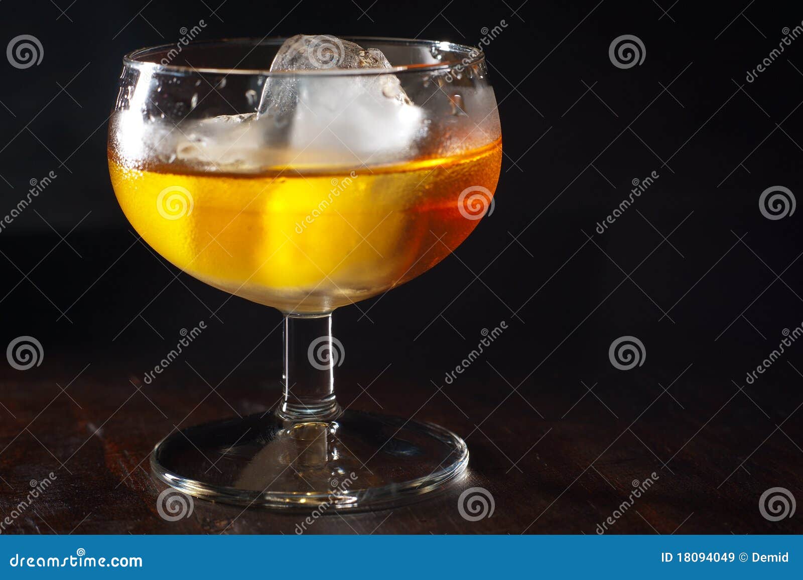 Glass with liqueur stock image. Image of cube, glassware 18094049