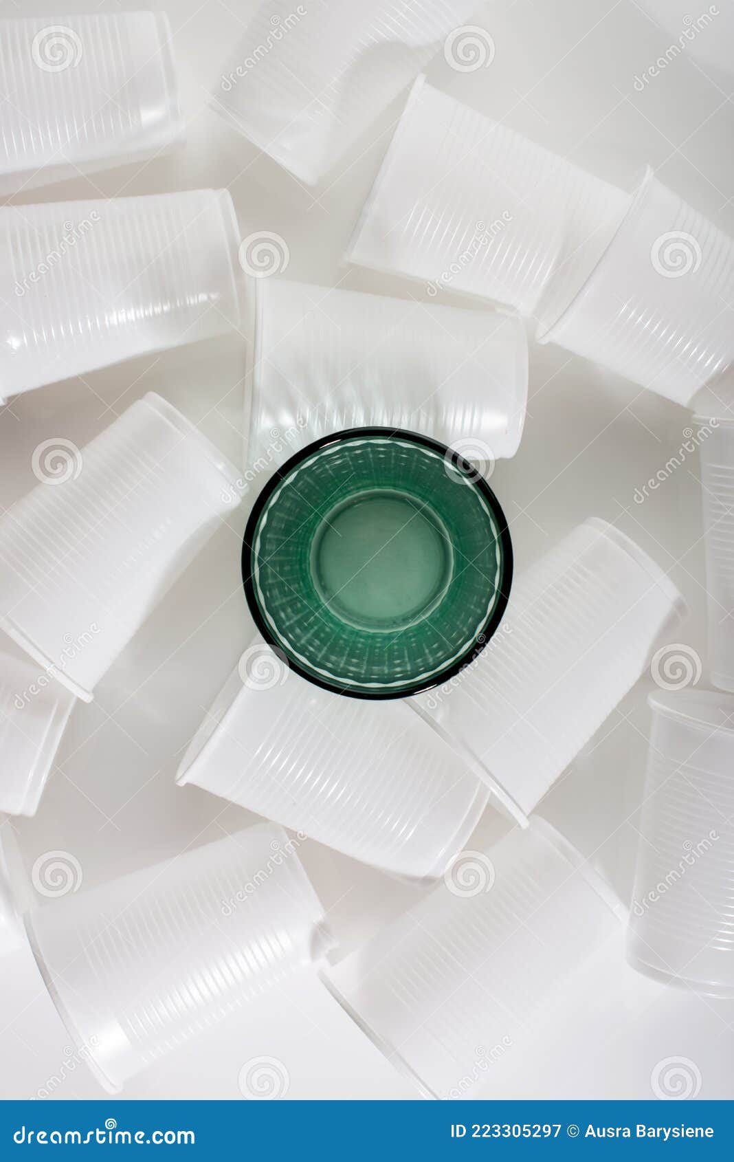 Glass among Many Plastic Cups. Glass or Plastic Stock Image Image of