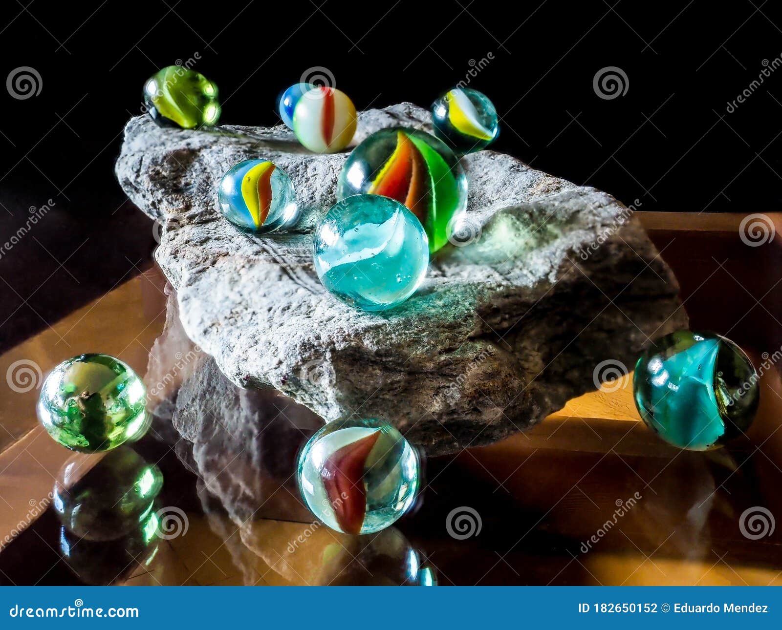 Colored Clear Glass Marbles. Stock Photo Image of childrens, childs