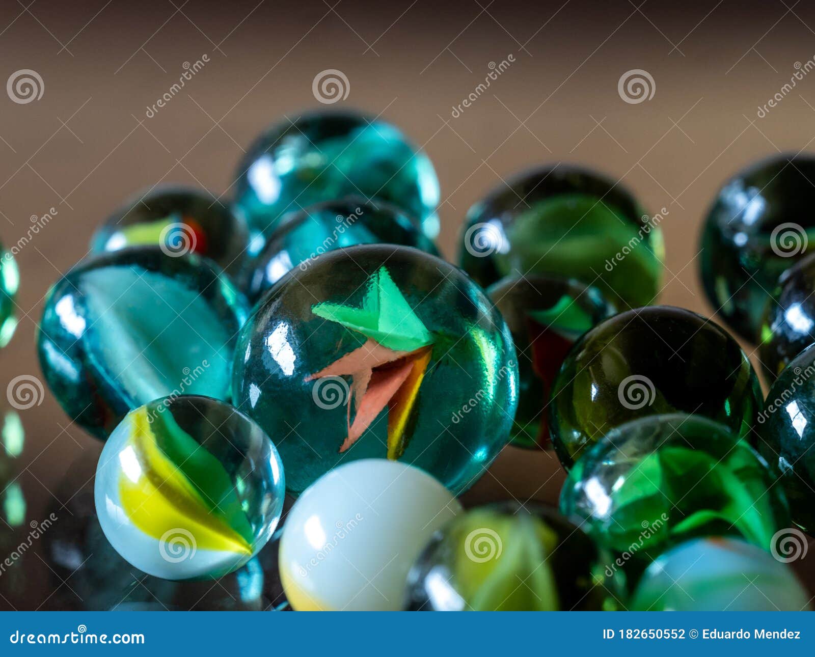 Colored Clear Glass Marbles. Stock Photo Image of round, yard 182650552